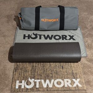 Gray HOTWORX bag with mat and towel